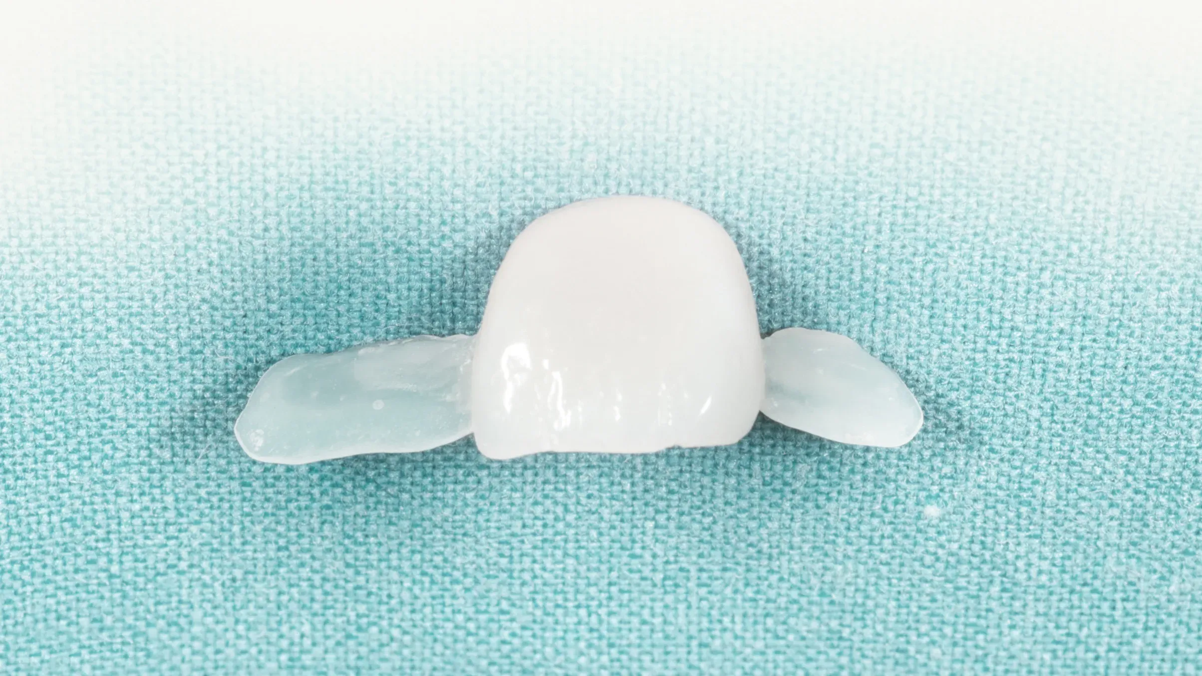 Dentapreg® BRAID applied for anterior tooth stabilization on dental model.